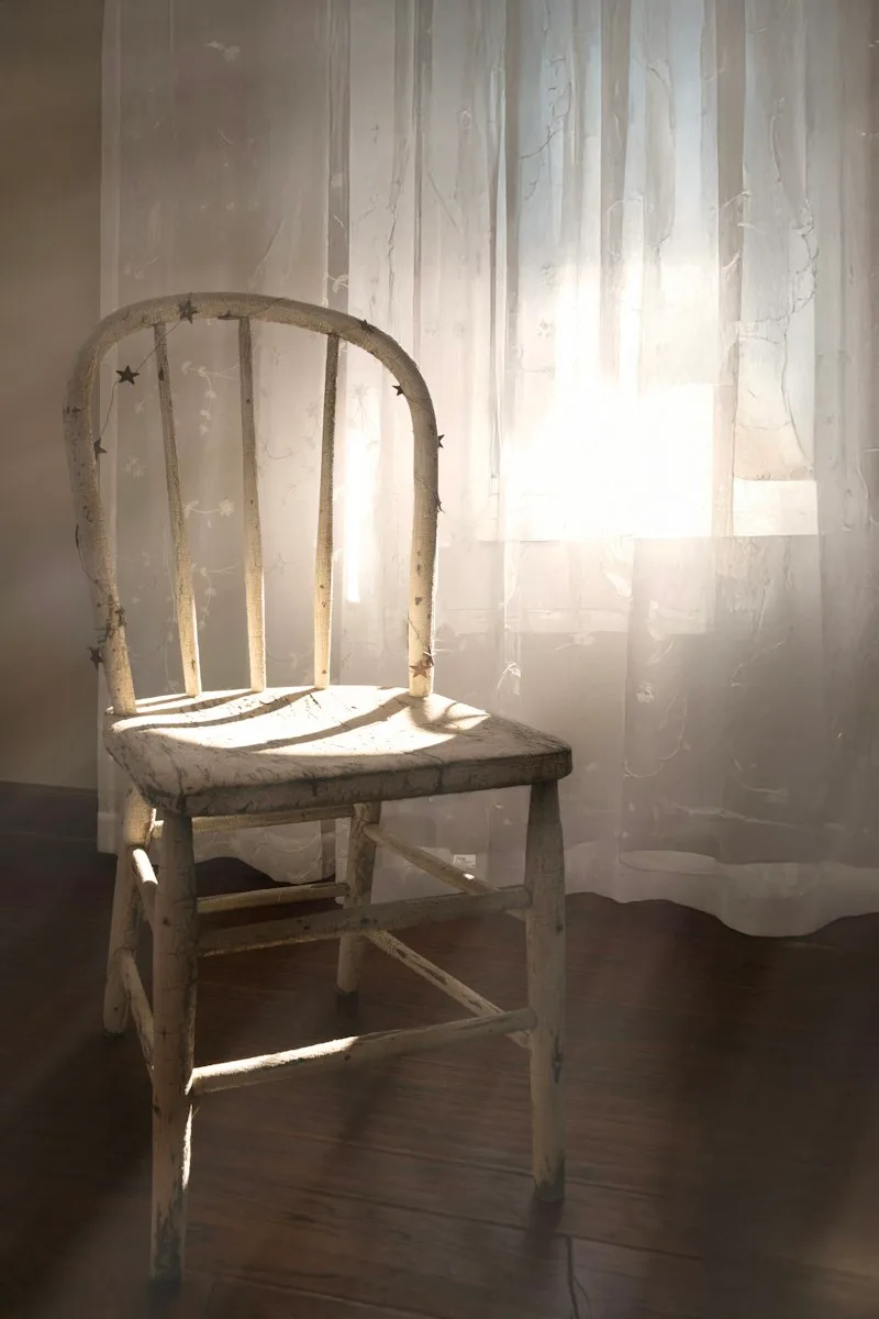 An antique wooden chair with character and patina